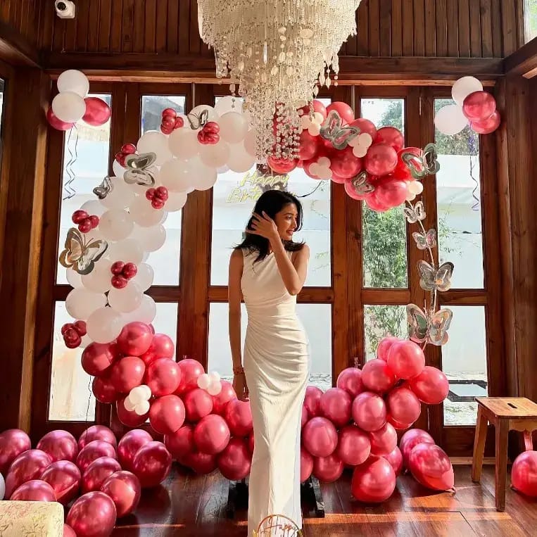 Birthday party decoration by The Tenderful - pink and white balloon arch setup